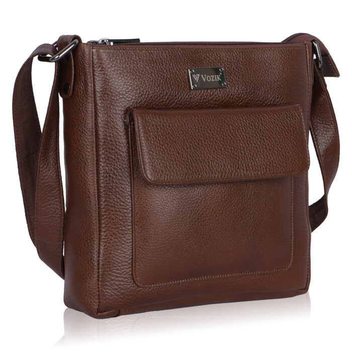 VOZIK Brown Unisex Crossbody Bag - Angled view, highlighting the textured leather and sturdy construction.