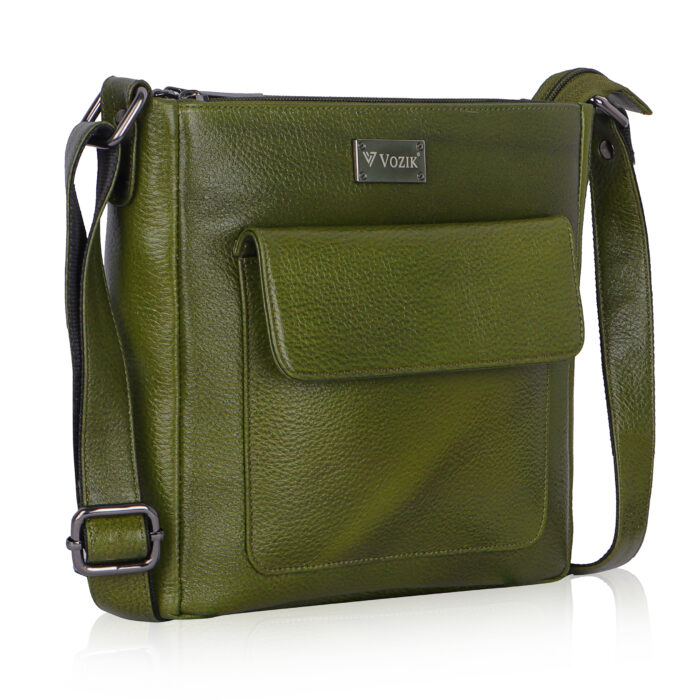 VOZIK Green Unisex Crossbody Bag - Angled view, highlighting the textured leather and adjustable strap with metal hardware.