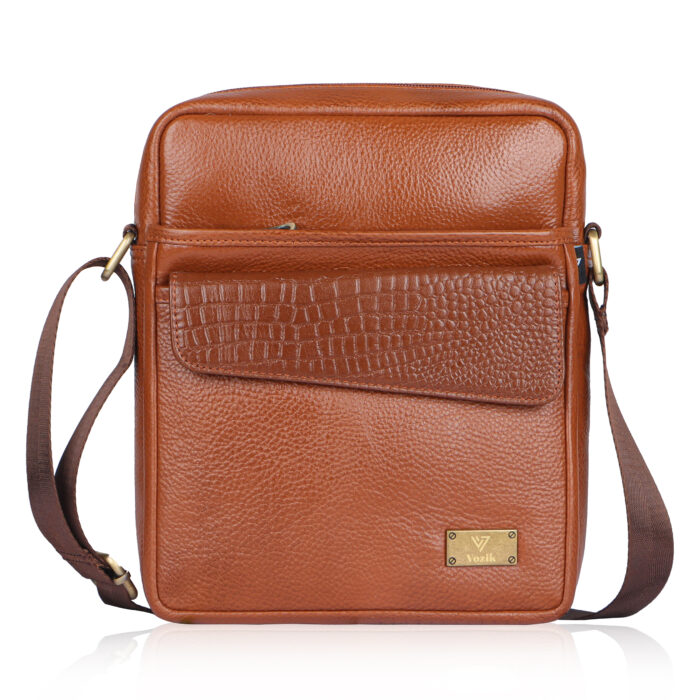 VOZIK Tan Leather Sling Bag for Men - Direct front studio shot showing the main body, front flap pocket, and leather color.