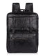 VOZIK genuine leather laptop backpack, showing front buckle pockets and premium texture.